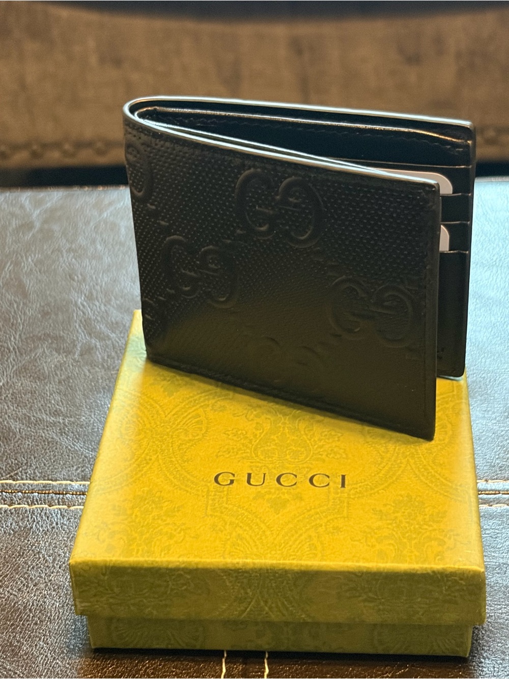 Gucci Black Embossed GG Bifold Wallet NWOT + Dust Bag + GG Box and GG Shopper